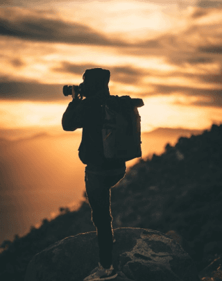 man taking pictues with a camera