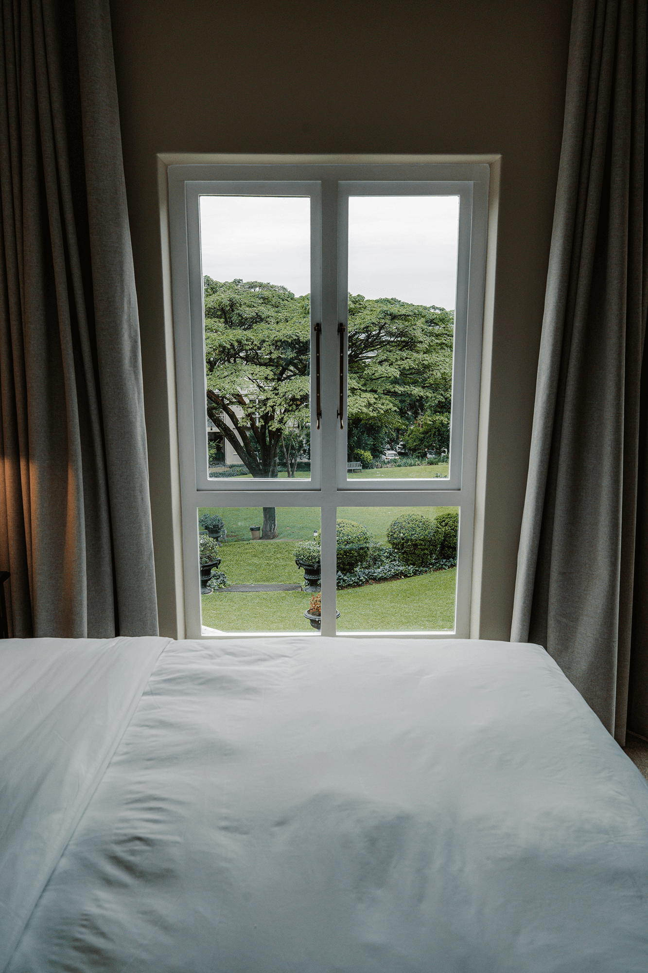 King-size bed in Executive Suite with luxury linens and stylish décor.