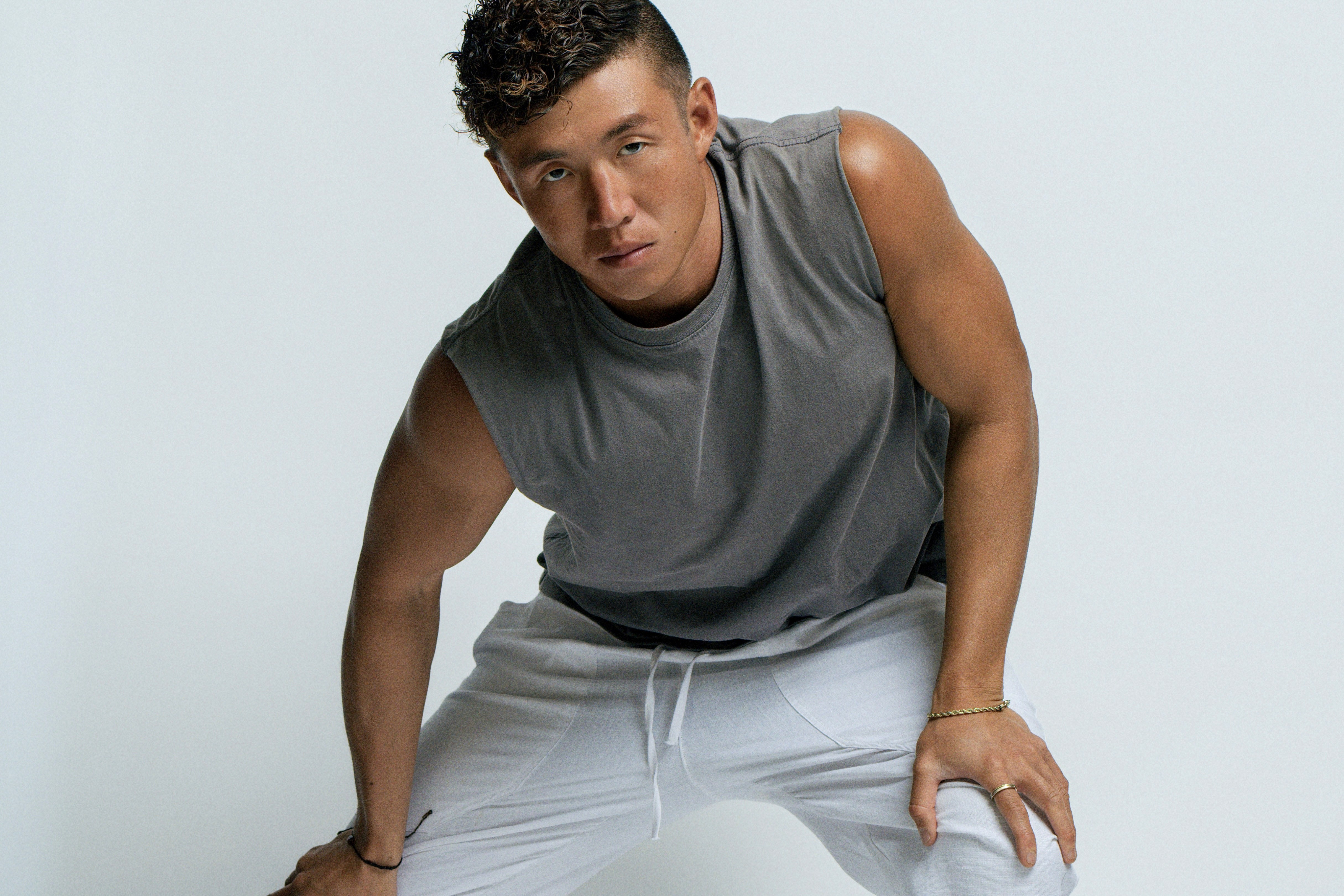 A happy customer smiling wearing orange headband