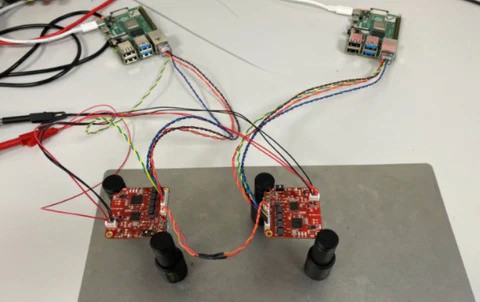 Test 1 bench: two SPEBlox converters linked by the short twisted pair between two Raspberry Pis