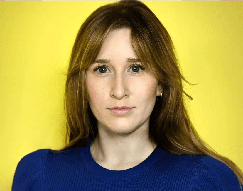 female photographer with red hair