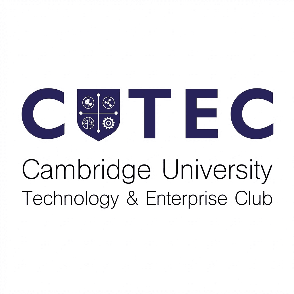 A man in a white lab coat working at a computer, viewing a 3D model on the screen in a laboratory or office setting.