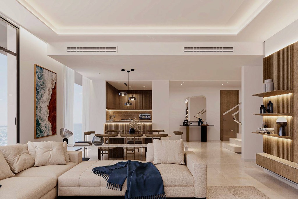 Sleek living room design with a comfortable couch and dining area, created by ARIA by Beyond.