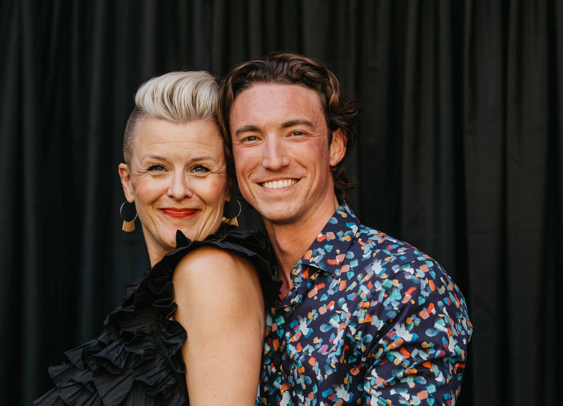 Group of people relaxing outdoors on a field or lawn