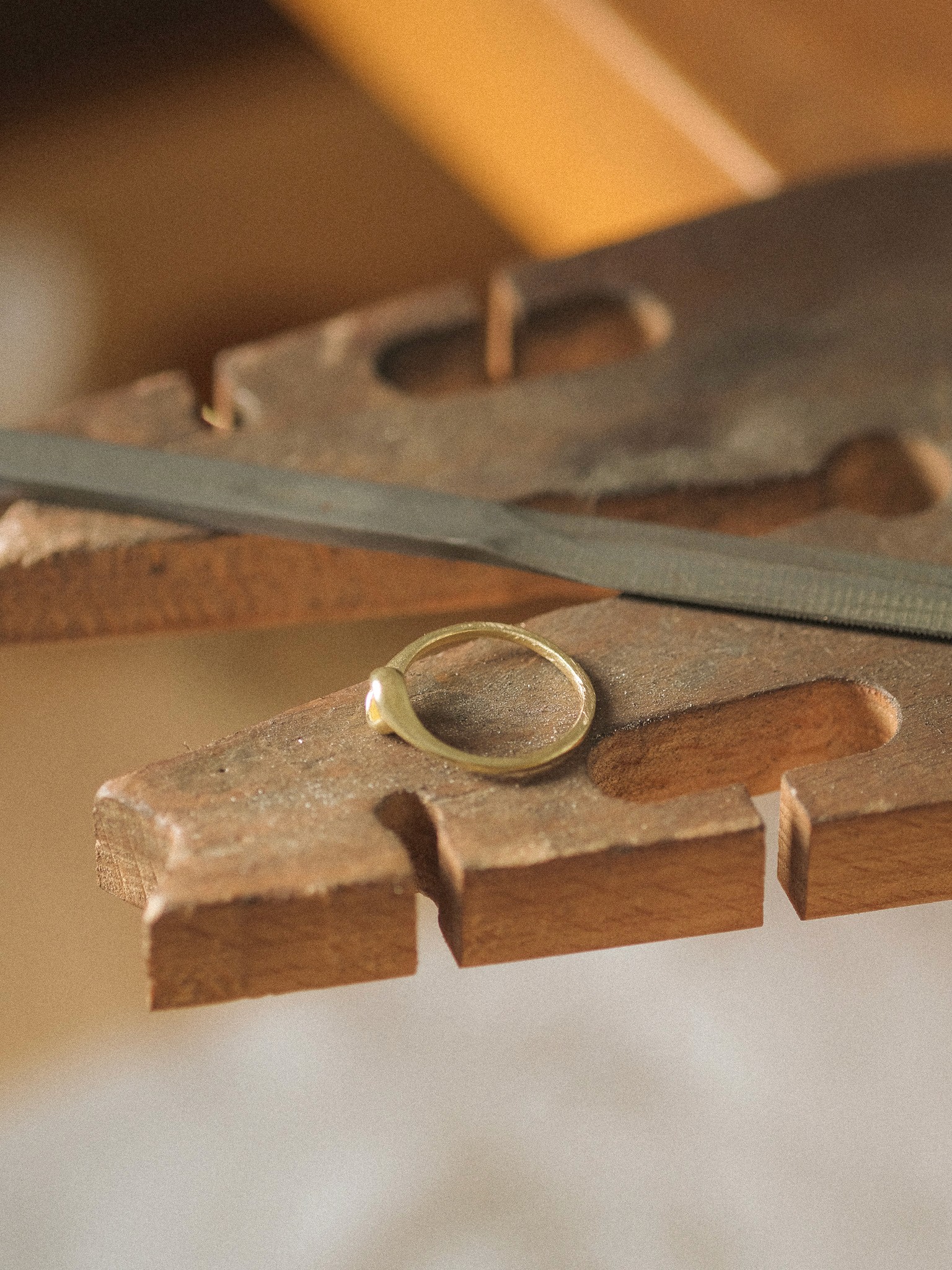 The tanzanite ring being made