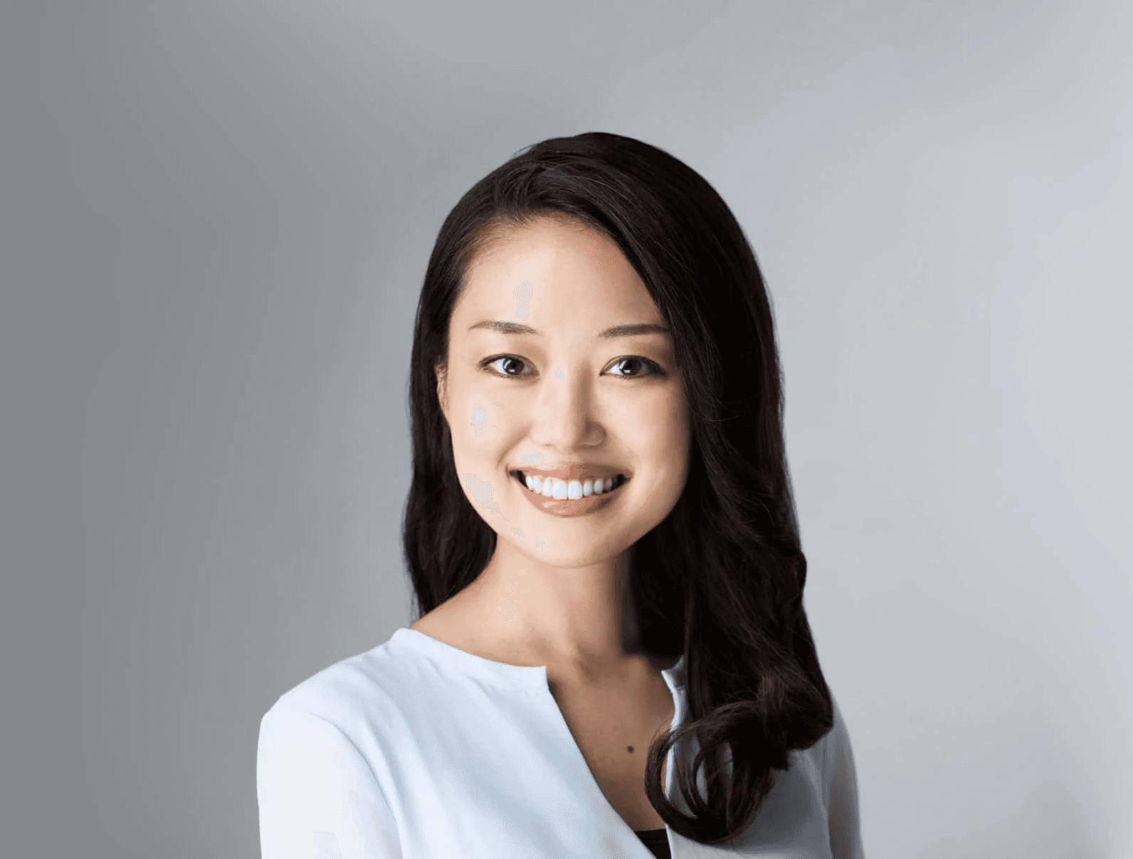 Woman smiling in an office