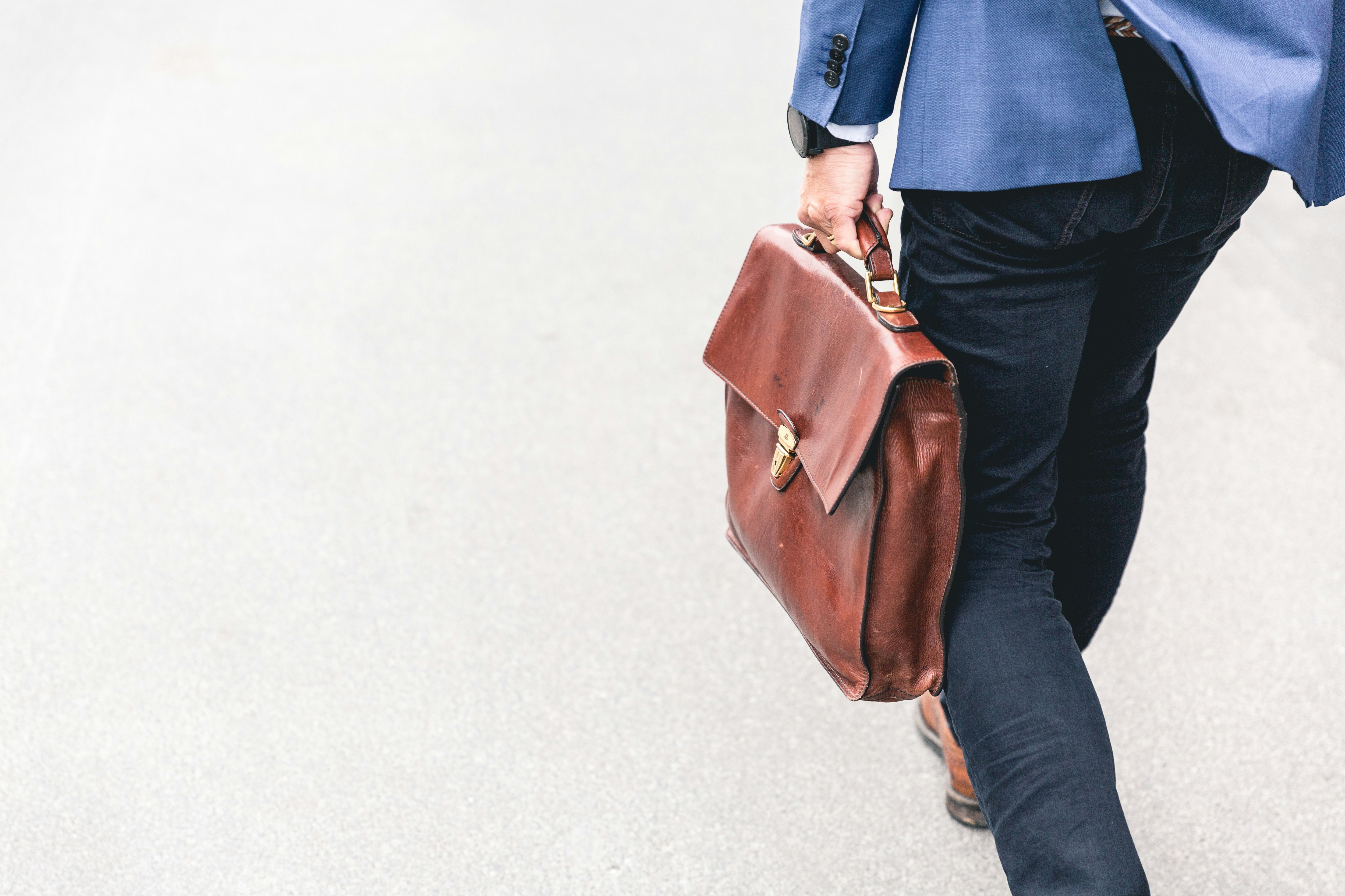 The post 'How to Choose the Right Lawyer for Your Case' features a man in a blue suit carrying a leather briefcase, symbolizing professionalism and readiness.