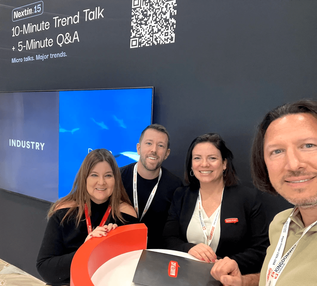 Photo of Tracy Landau, Jake Klinghammer, Nicole Hill, and Phil Landau at the Nextin booth at SupplySide Global.