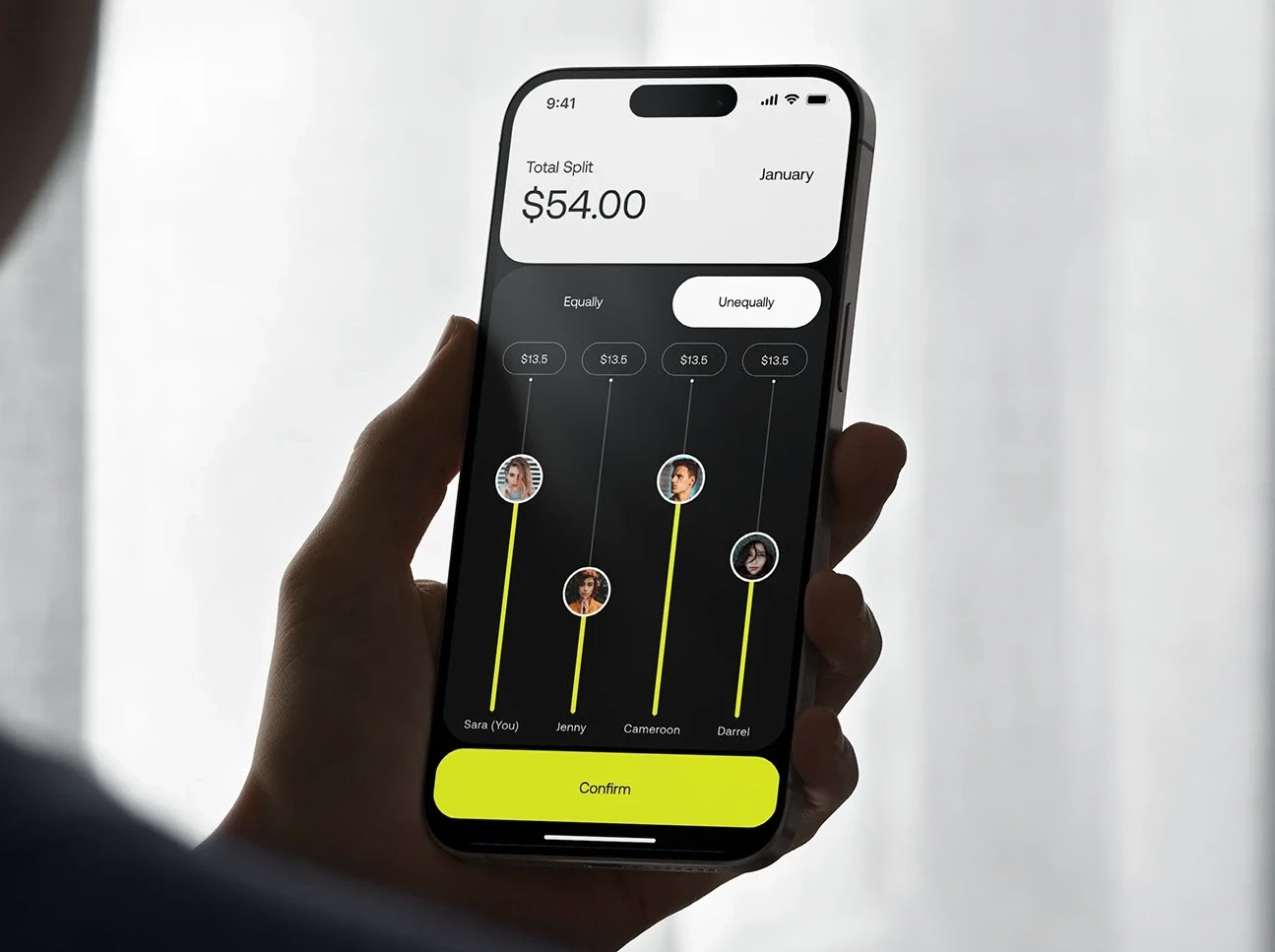 A stylish individual in a black shirt and silver pants stands against a blurred background, creating a dynamic and modern aesthetic.