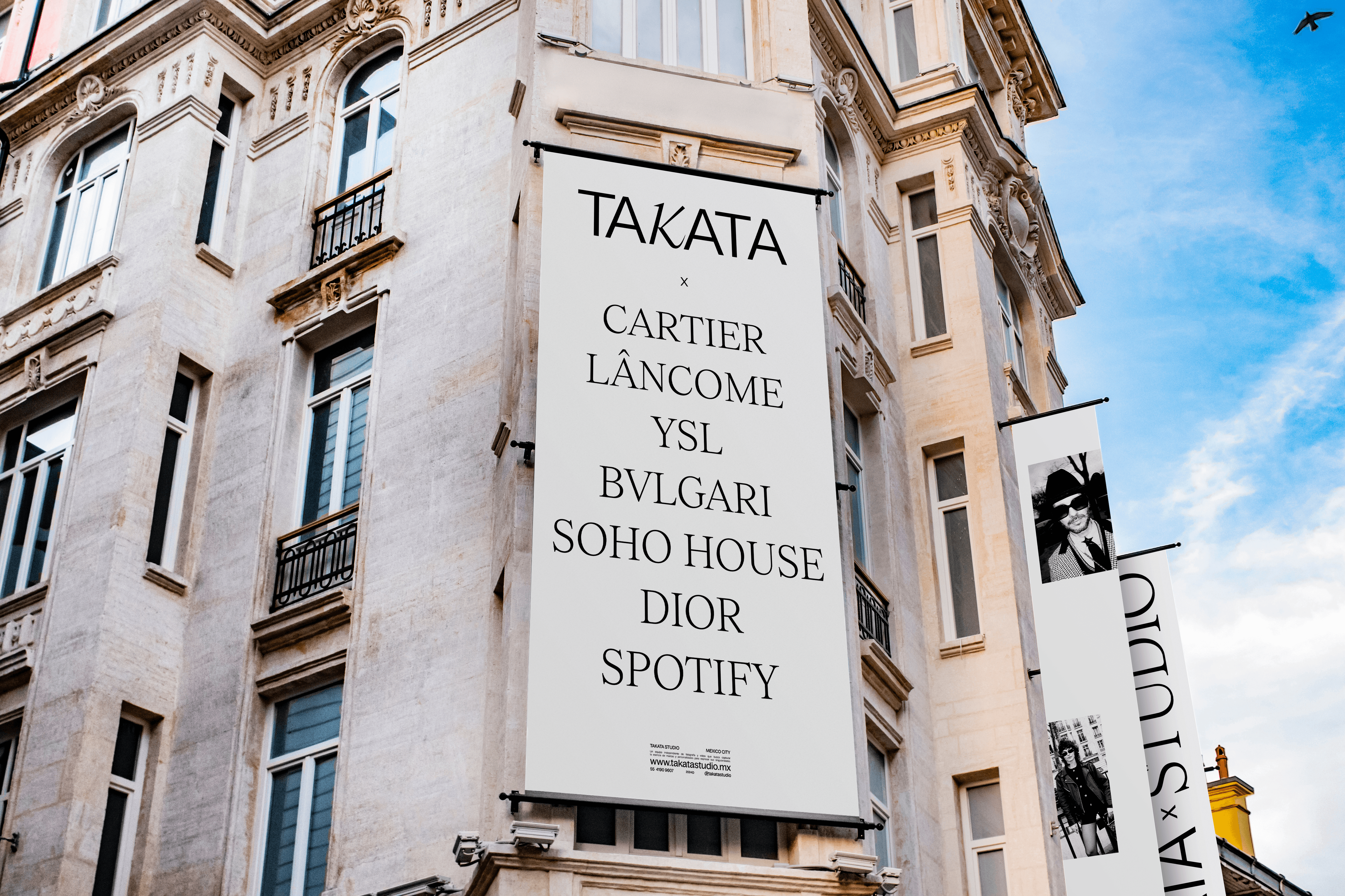 Streetside billboard with flyposters of the Batch.Works brand and illustrations