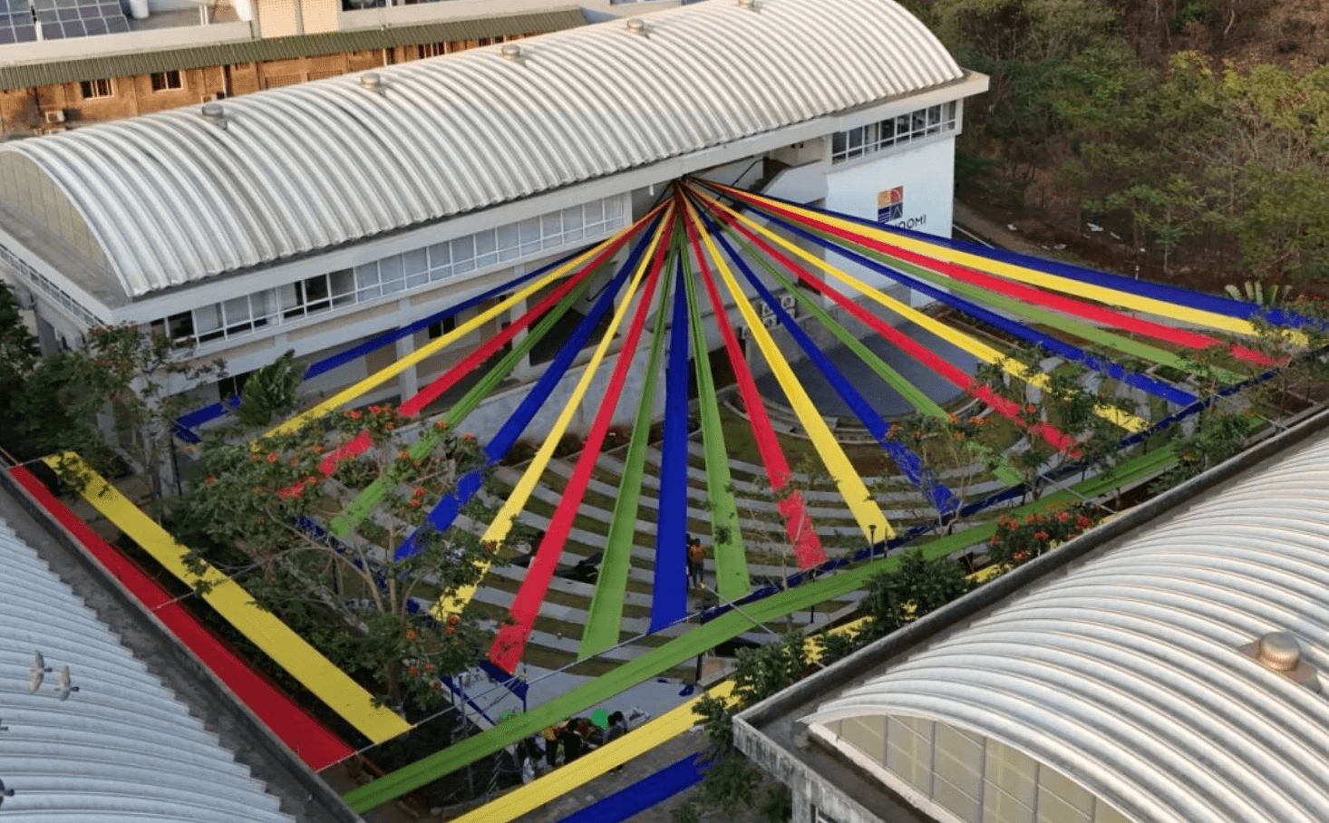 Singer crowd surfing at outdoor concert