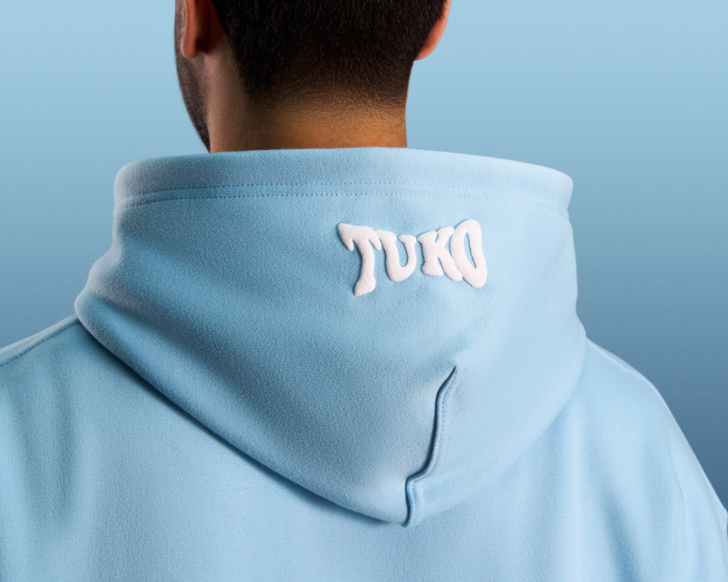 Tuko Clothing blue Dandadan inspired tracksuit detail shot photographer by Matthew Brown (London product photographer).