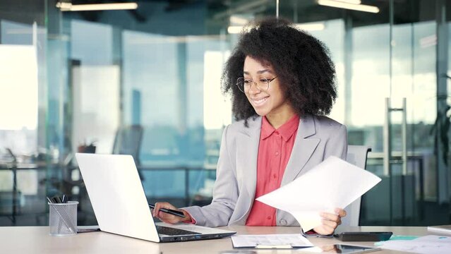 Young lady at work setting at desktop working