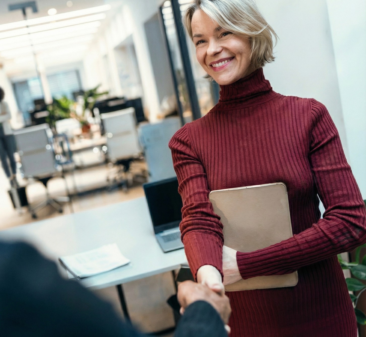 A laptop screen displaying a settings menu with a highlighted product tour in blue.