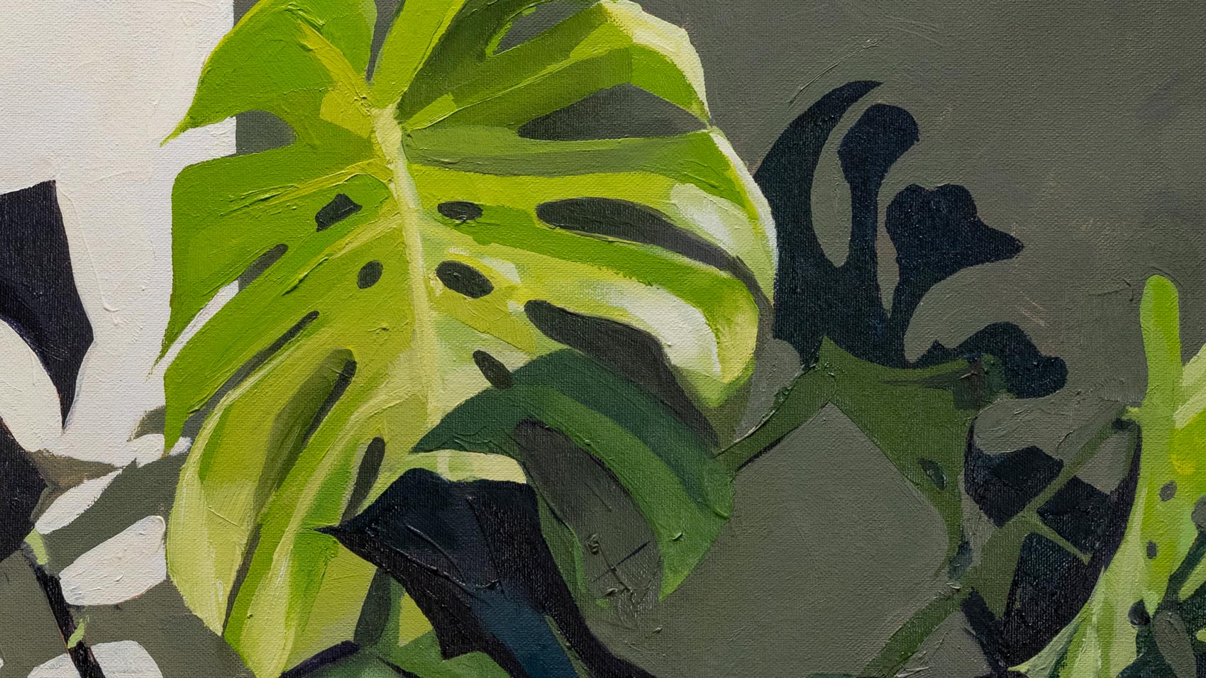 A close-up of a monstera painting, featuring vibrant green hues and brush stroke textures