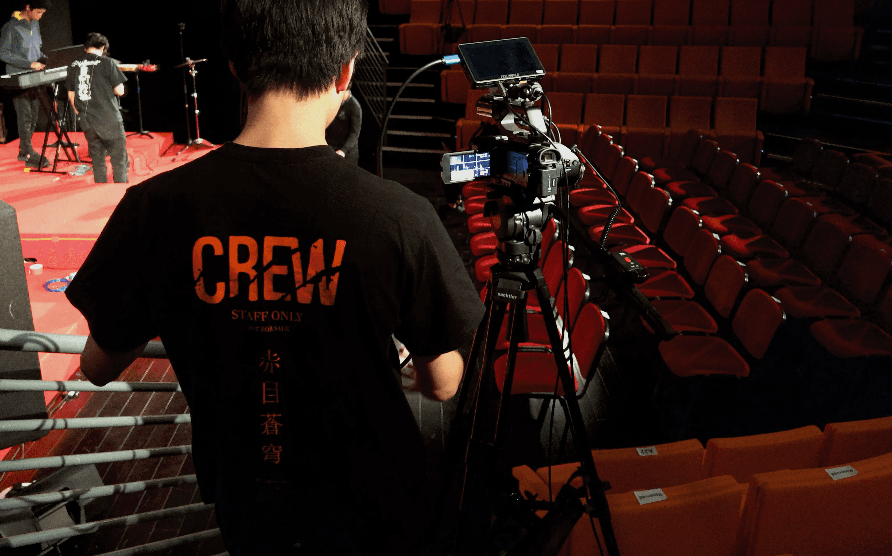 crew members at work wearing the t-shirts designed for crew members