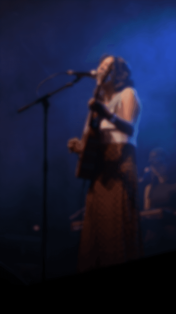 Picture of an Artist singing, standing for "Artist Visuals"