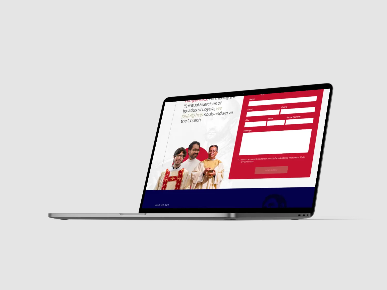 A laptop displaying a promotional webpage with colorful graphics and a call-to-action button.