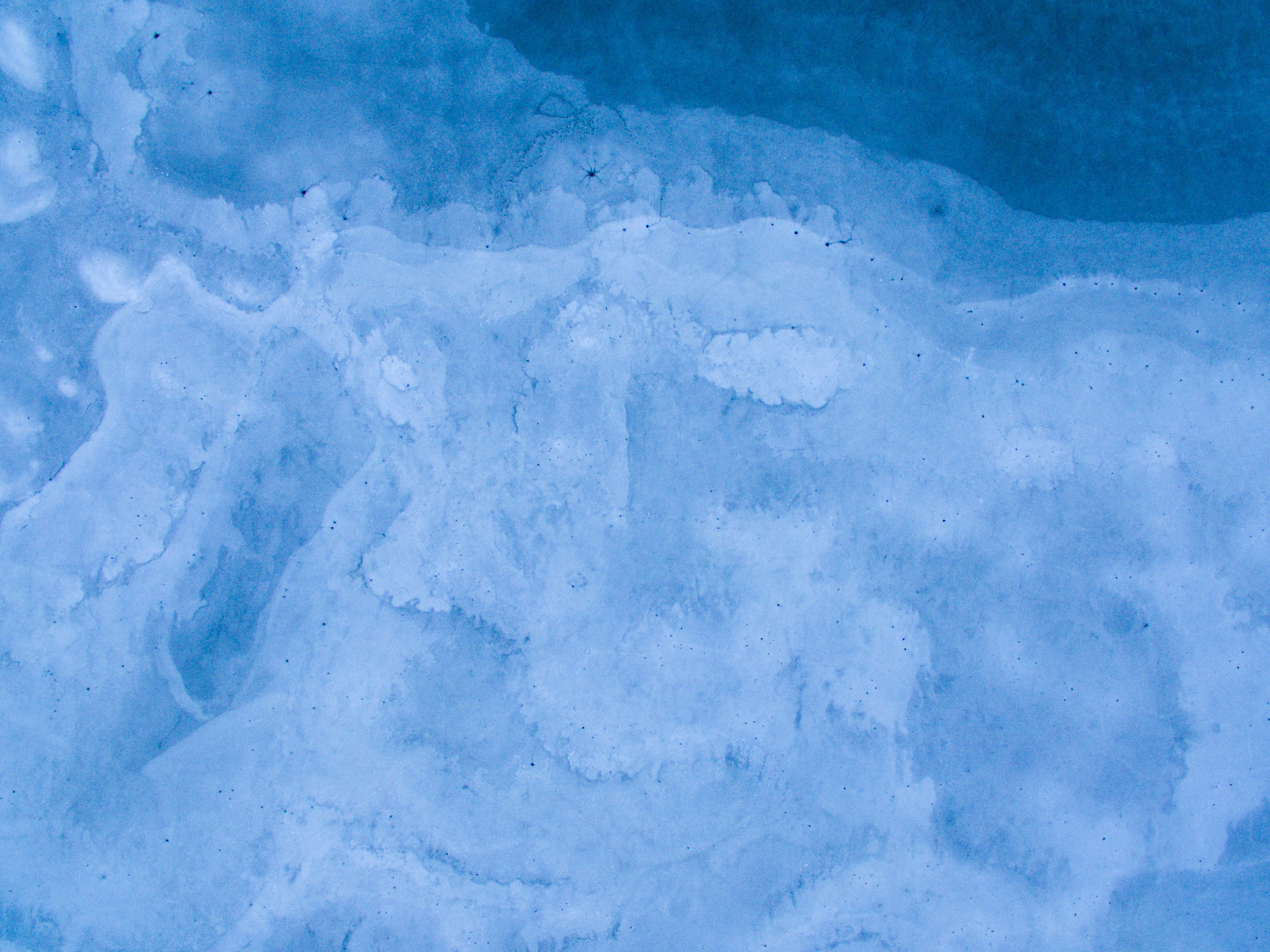a close up of a snow covered ground