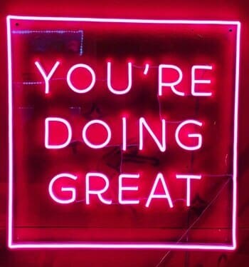 Neon sign saying YOU'RE DOING GREAT