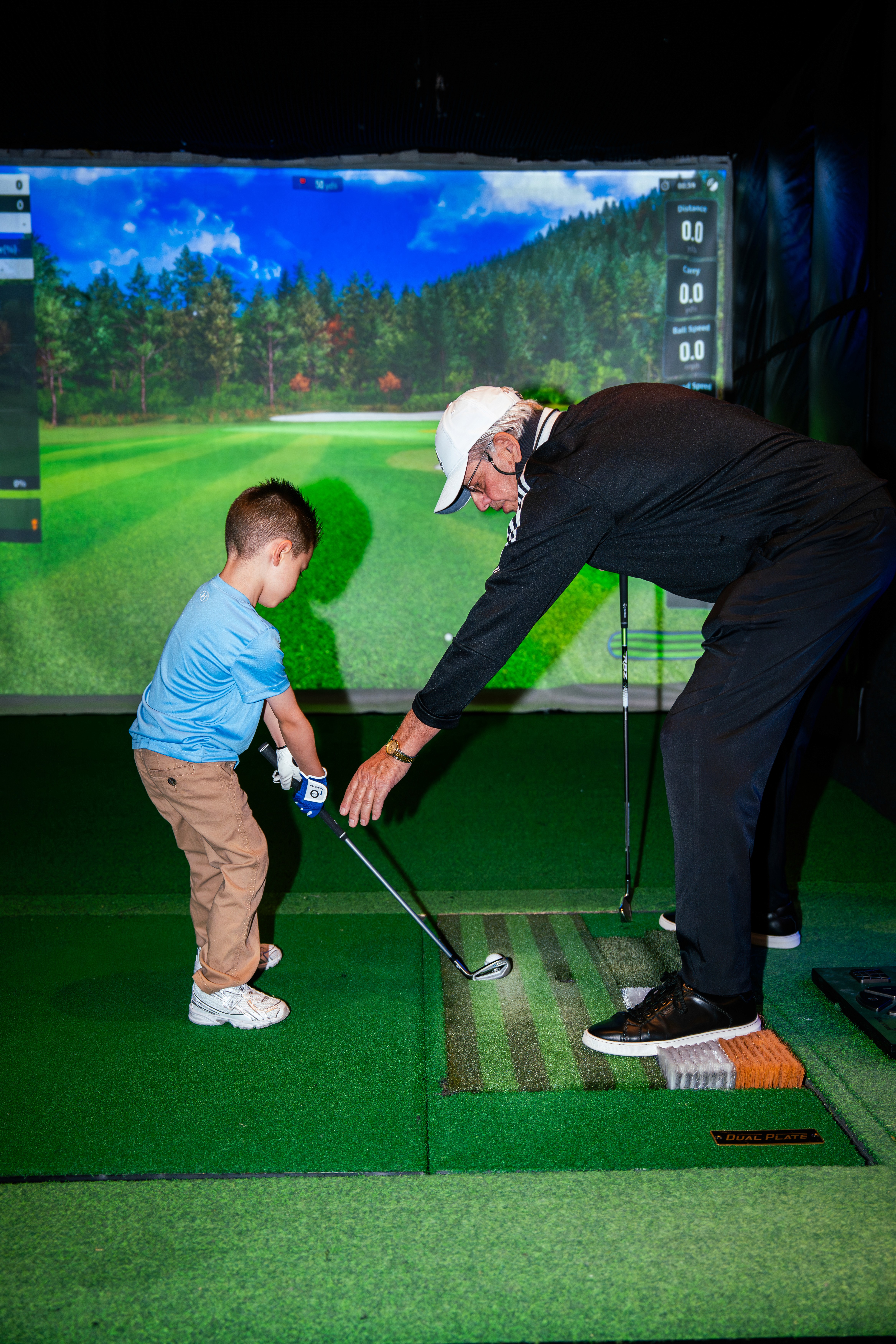 golf balls on the green grass with shoes