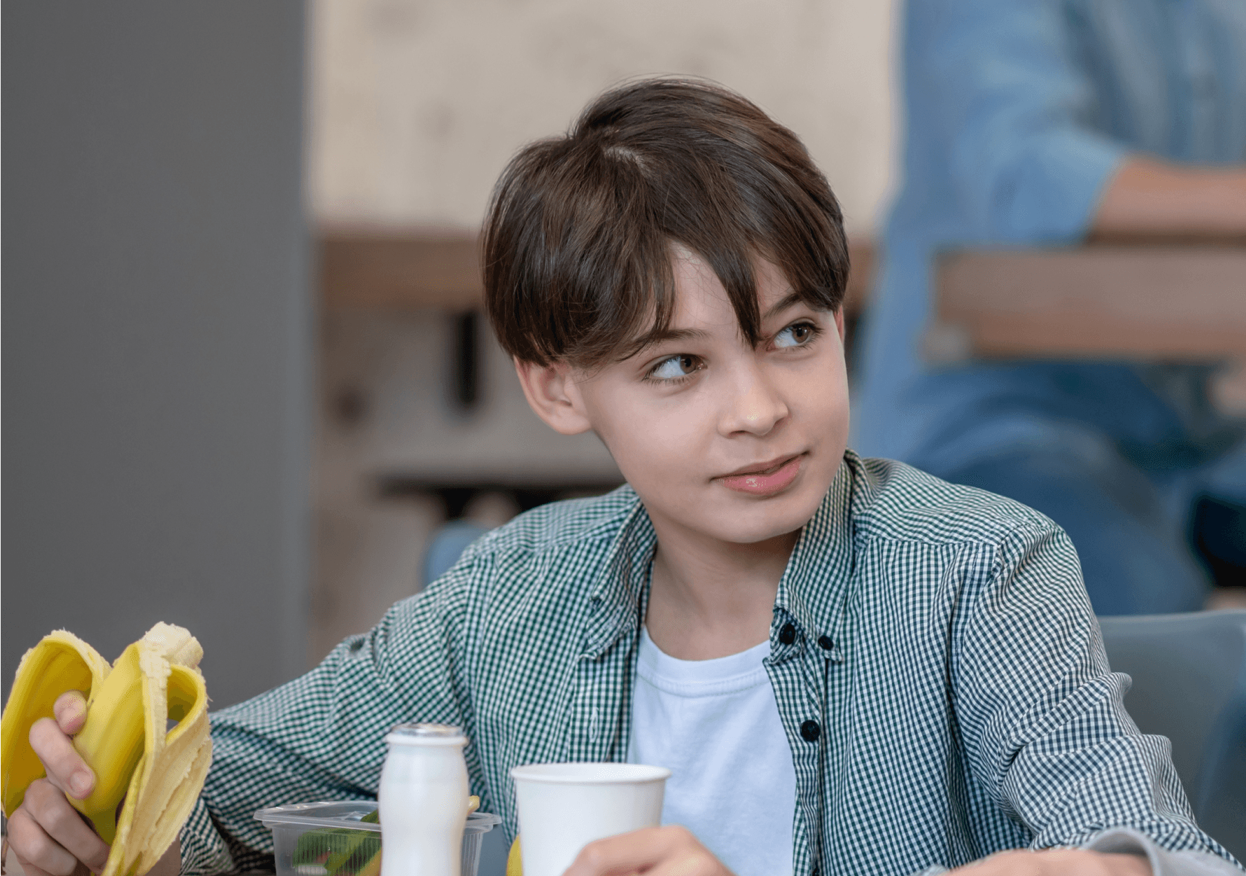 teenager with banana