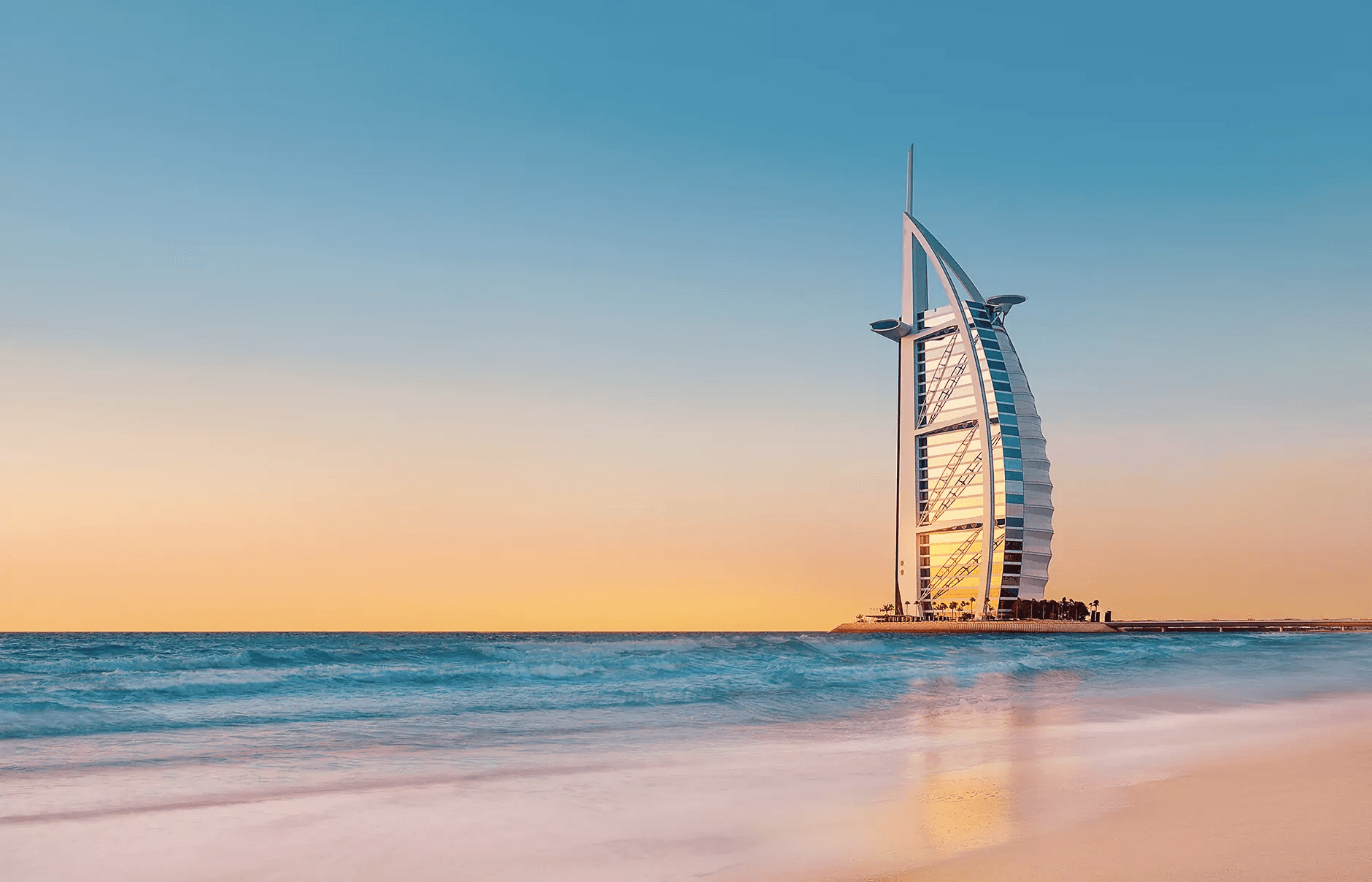 This image features the Burj Al Arab hotel in Dubai, UAE
