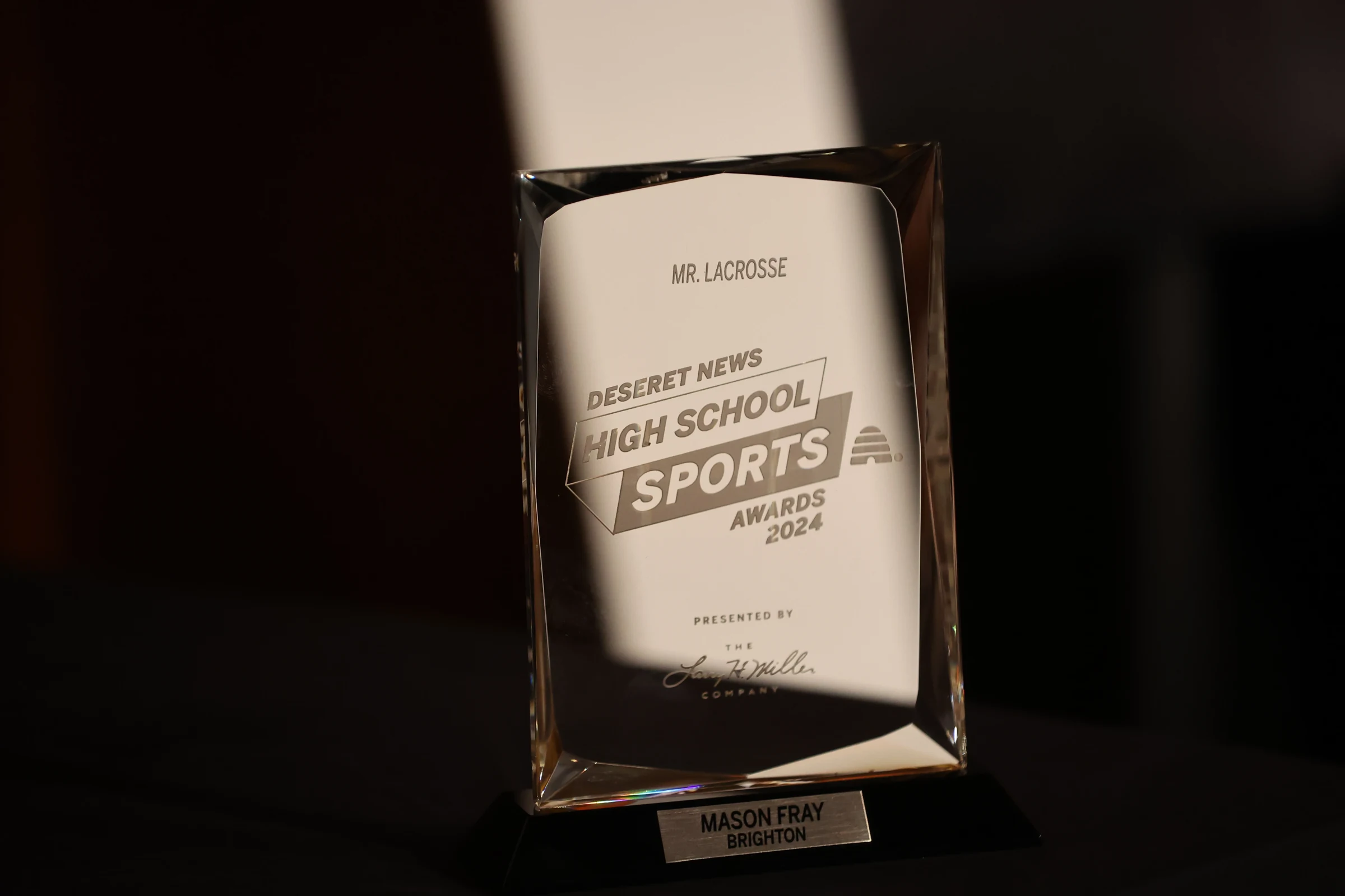 Awards graphics engraved on a glass Mr. Lacrosse award
