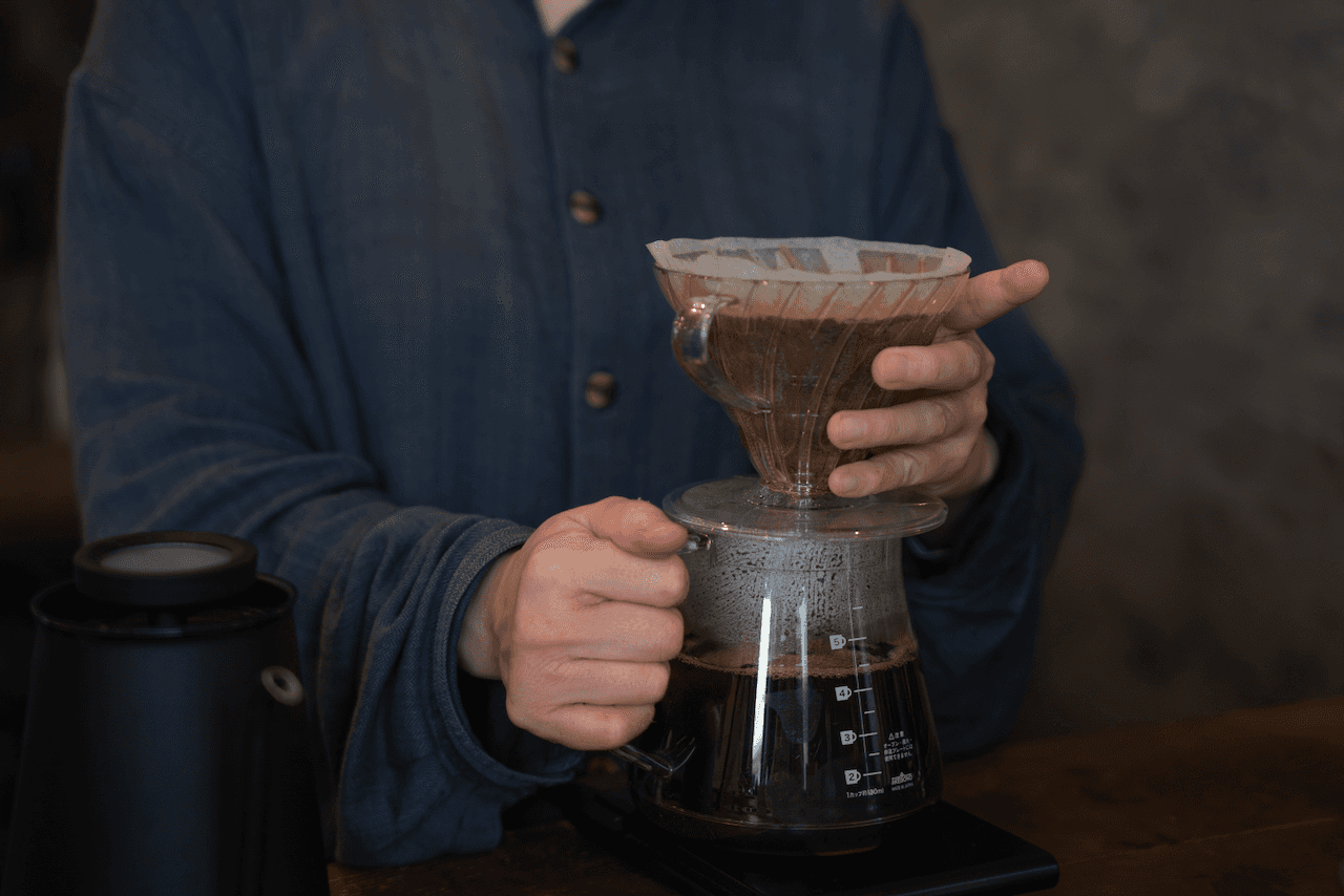 Barista making drip coffee at SPAiCE Coffee House