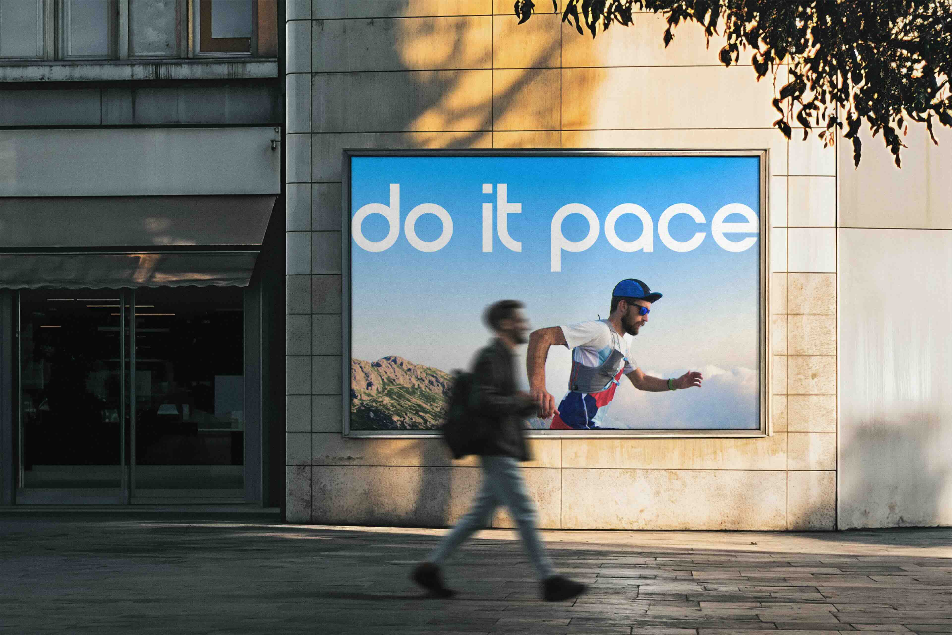 Gold flower-shaped brooch with blue gemstones placed on a card atop a decorative silver plate, with a fork and knife on a red background.