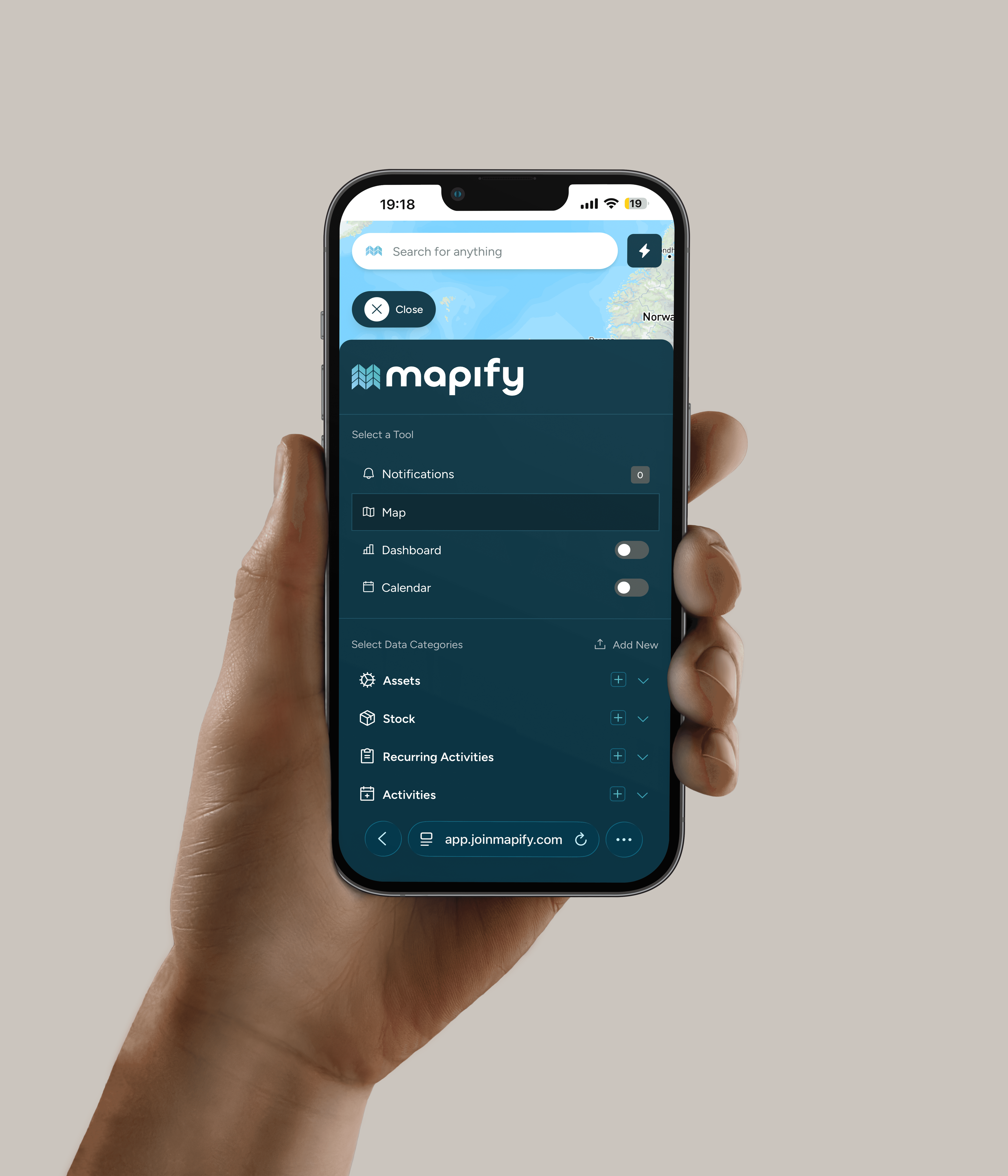 Wooden outdoor table set with multiple plates of food, including dips, salads, potatoes with cheese, and glasses of water, with hands reaching in to eat.