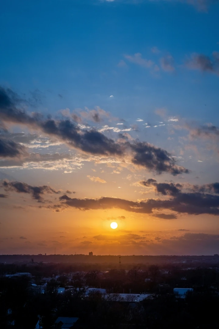 Silhouette of mountain under cloudy sky during sunset, Council Bluffs, IA.