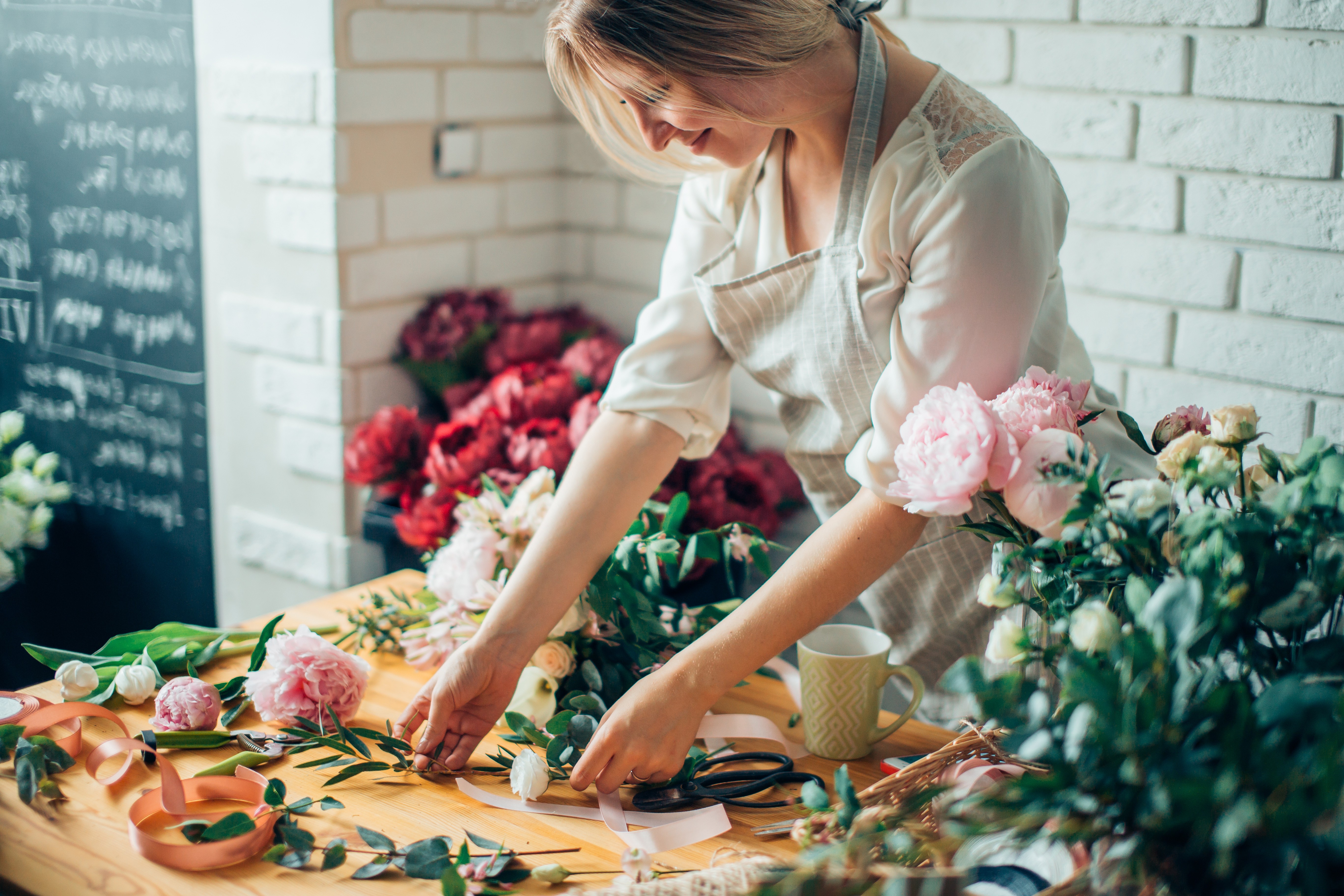 Florist preparing a bouqet