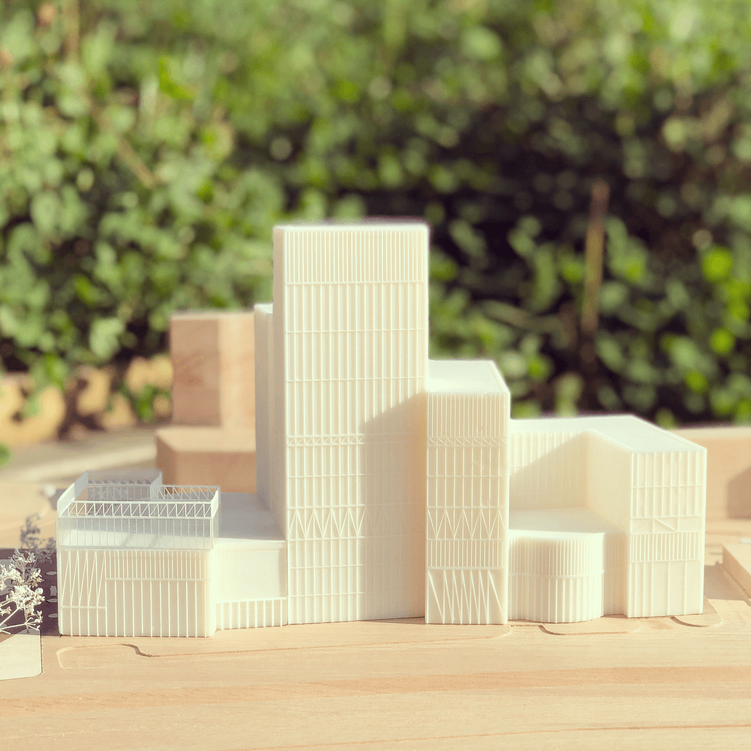 Wooden base with white 3d printed building