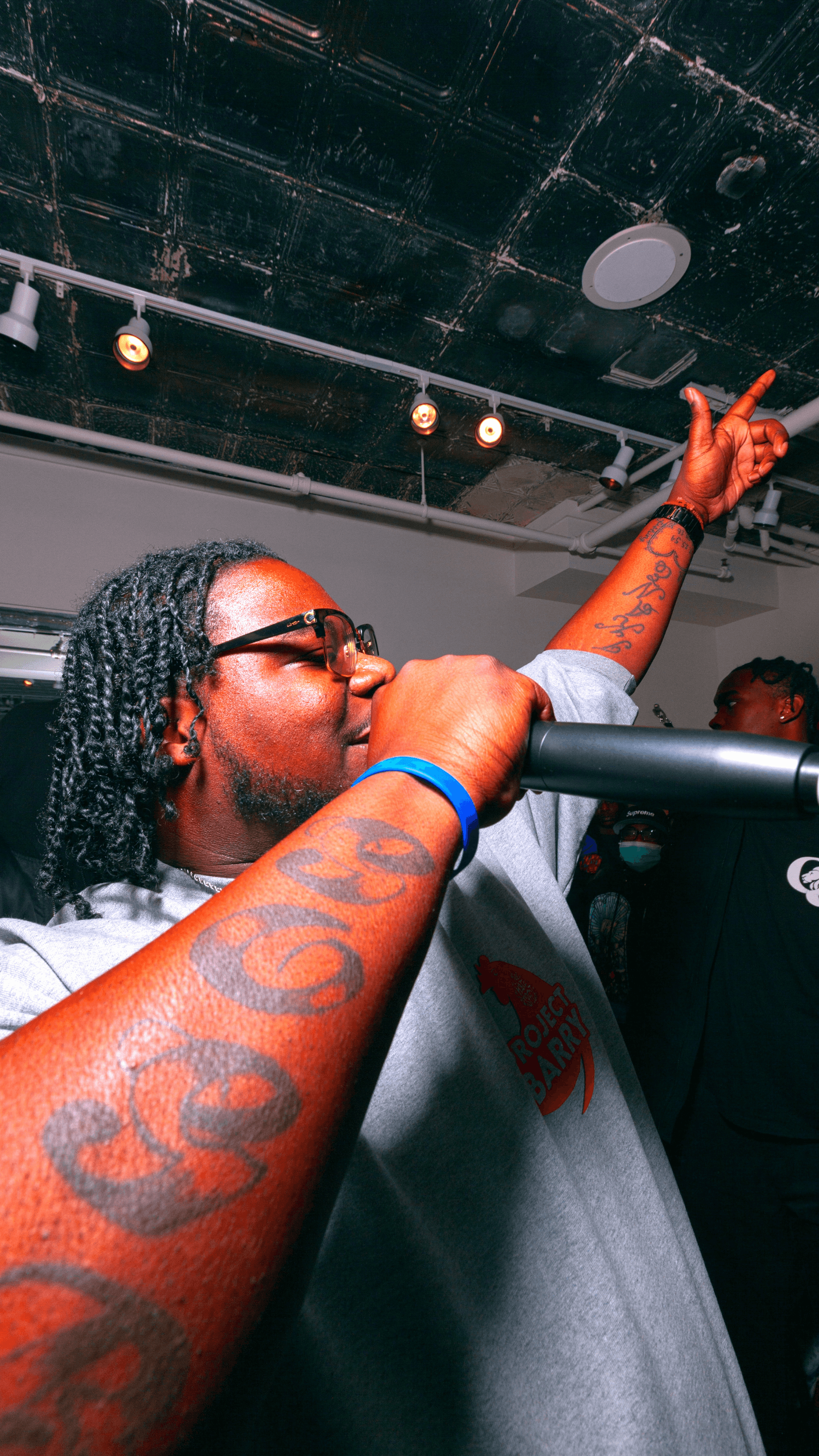 woman sitting in a garden and posing for a picture