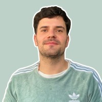 man crossing both arms