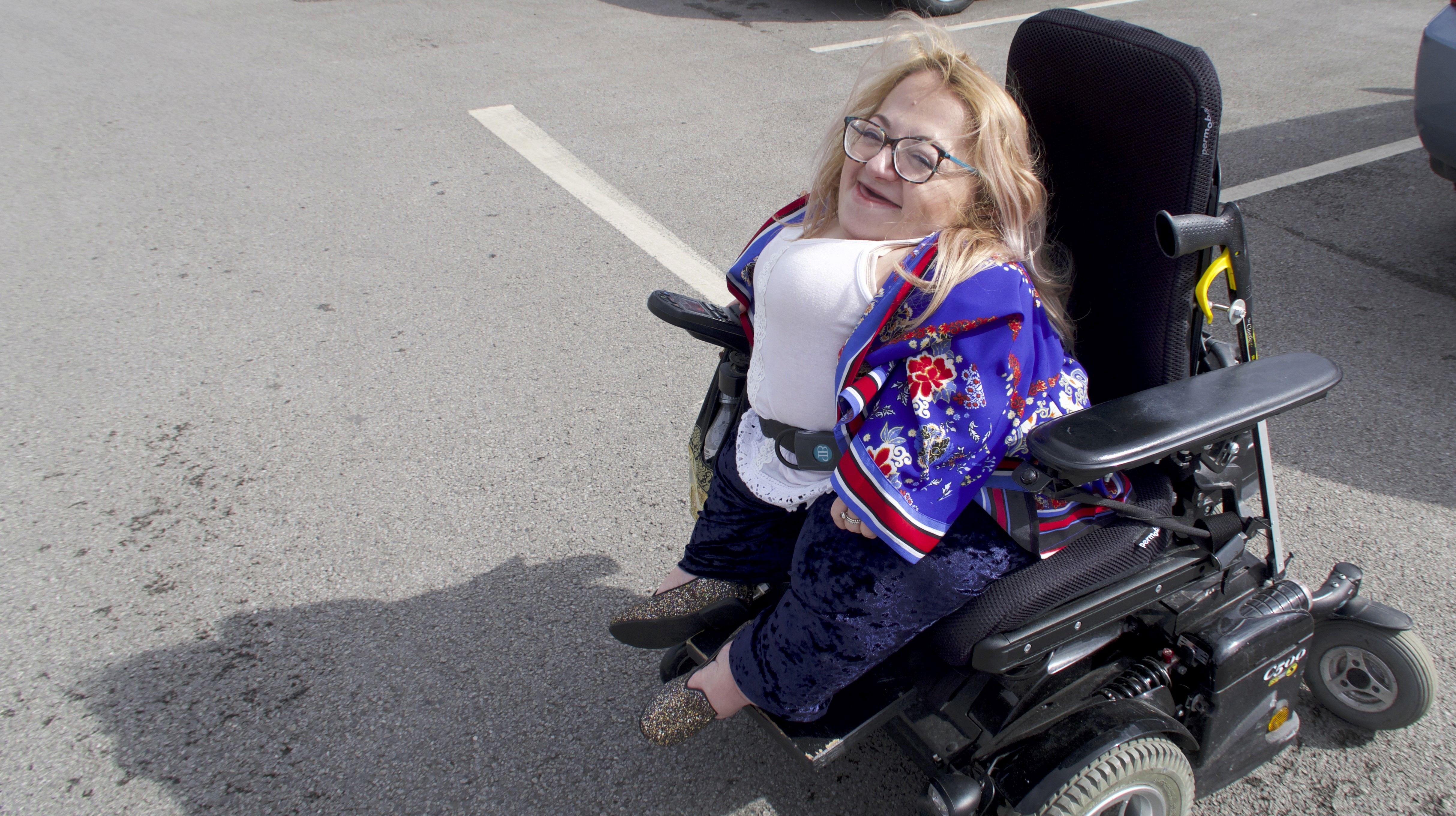 Gem in wheelchair laughing