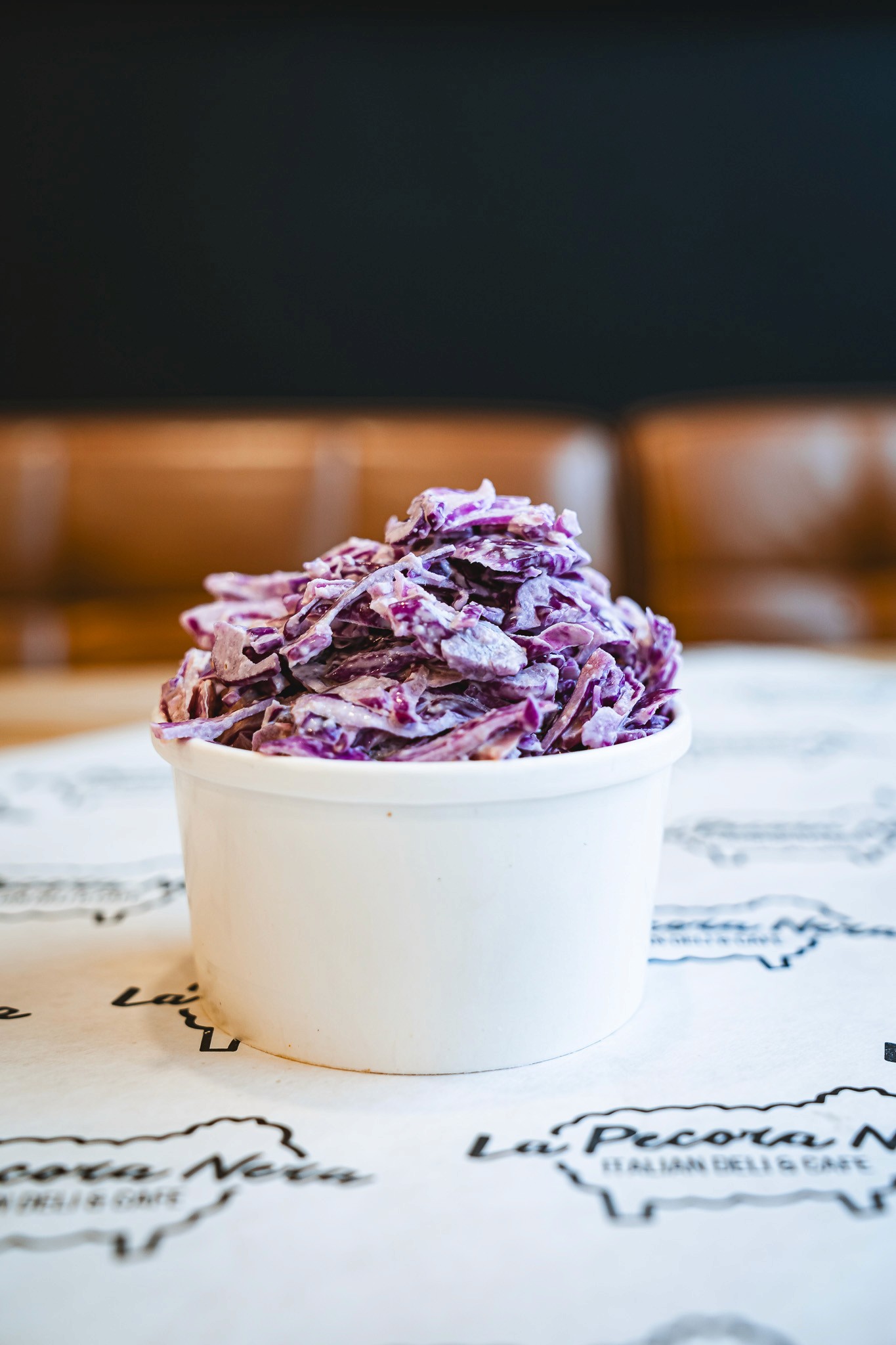 green salad in a black bowl