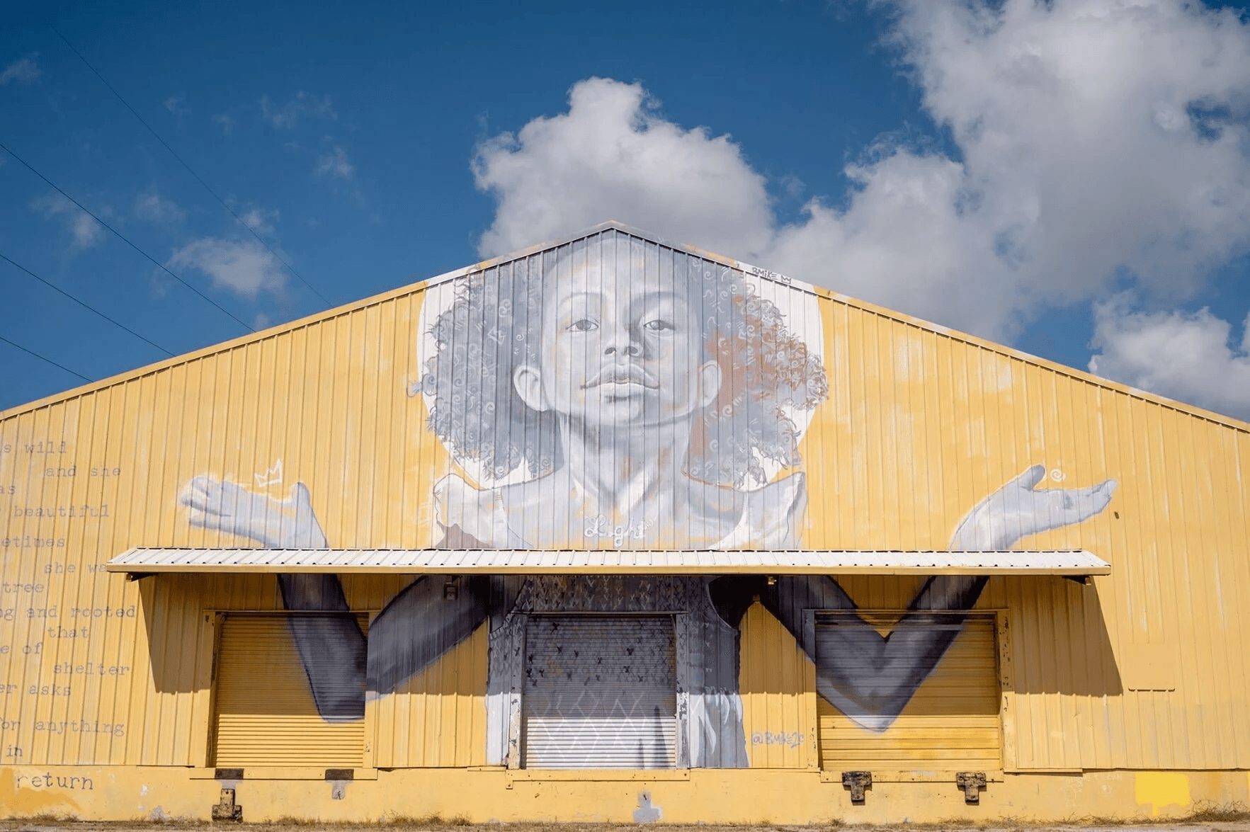 Street art on a yellow building in the Bywater in New Orleans