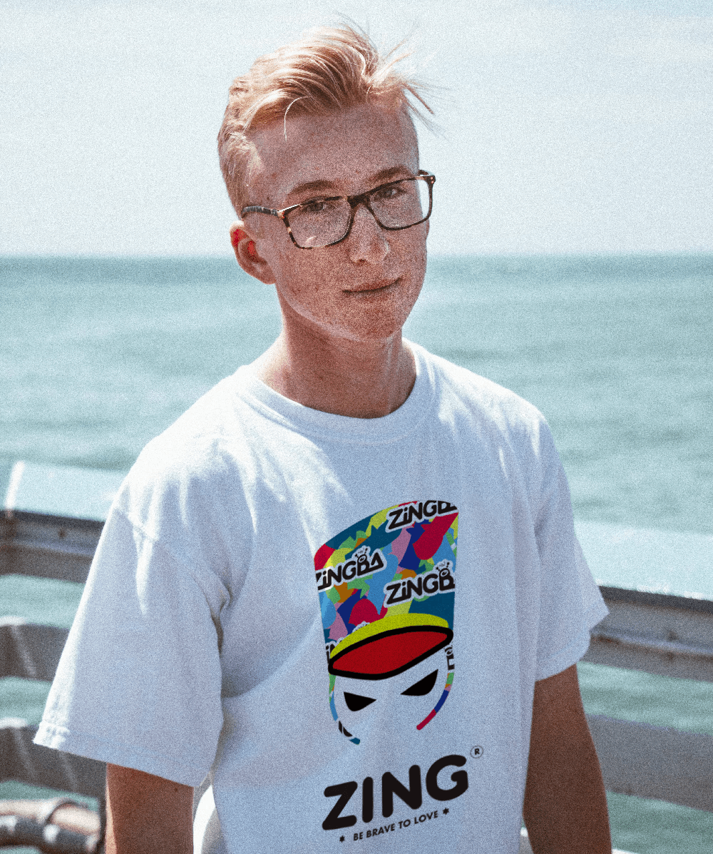 A close-up of a hand wearing multiple decorative rings against a blue background.