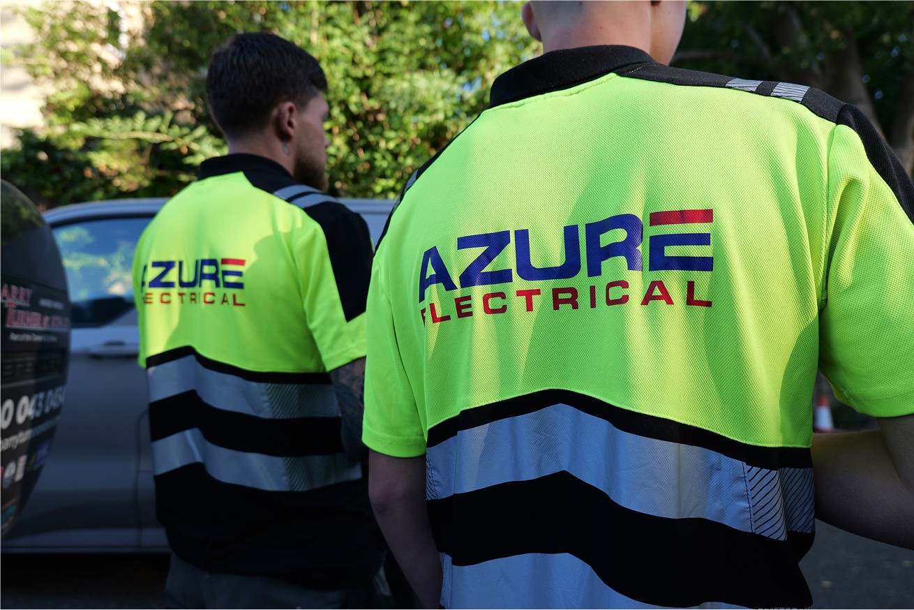 Team at Azure Electrical having a discussion outside Turner and Co Office