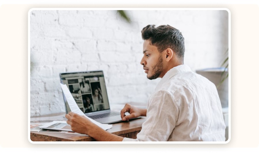 Man reviewing a printed document