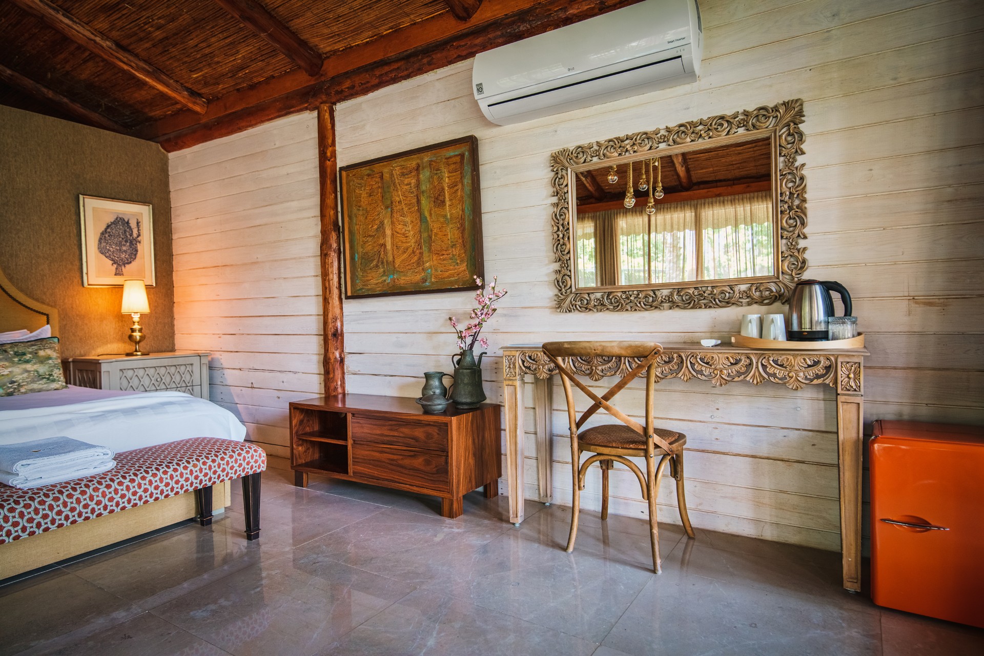 evening mood lighting, with the balcony doors open, glowing bedside lamps, sunset light streaming in.