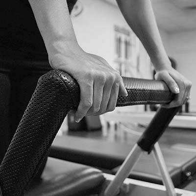 Hands on Reformer Footbar at True Pilates Method Camden NSW