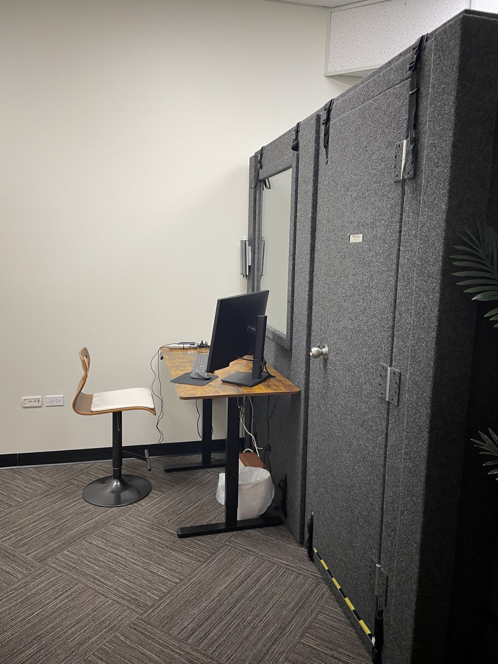 Old brick building with archways and windows.