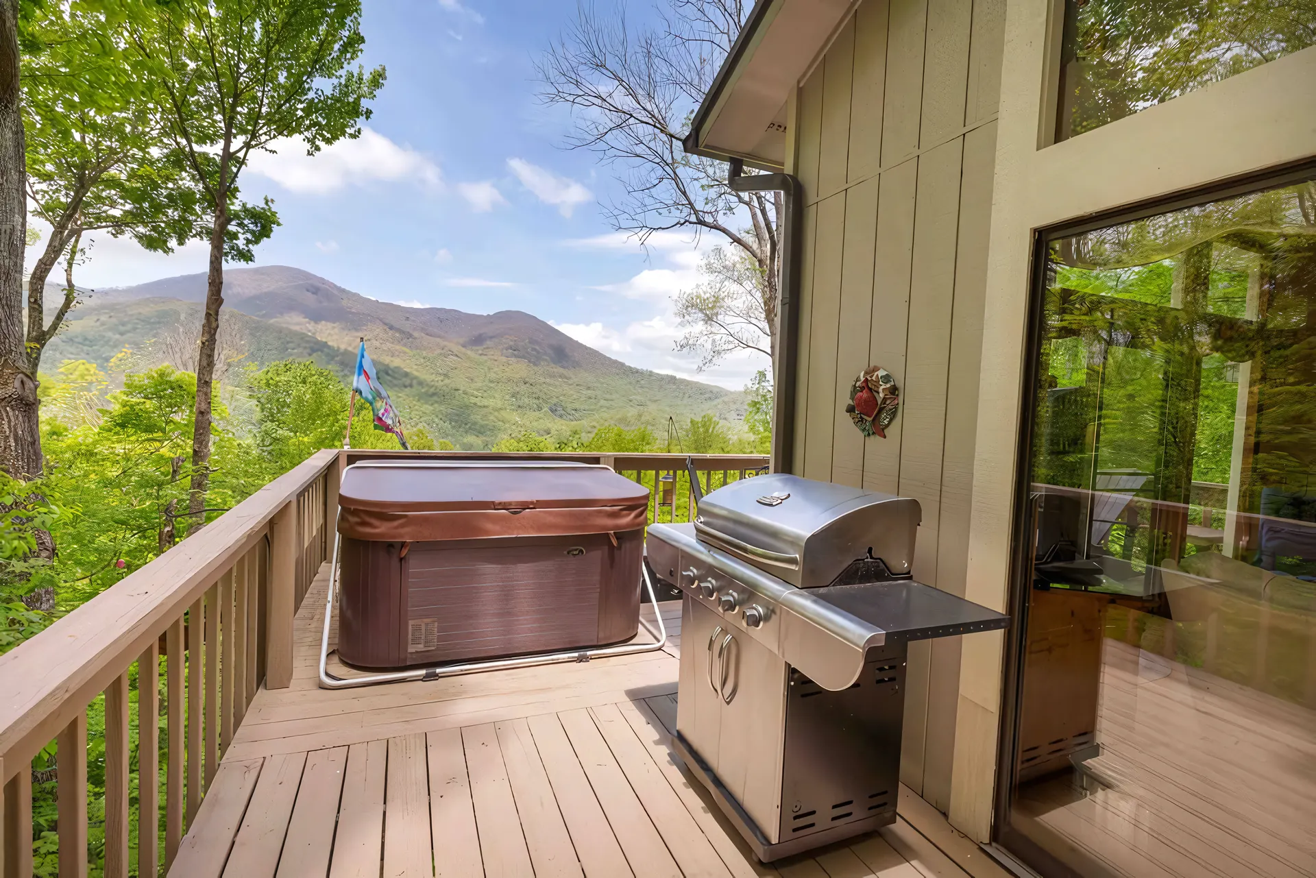 Bella Vista deck with the covered hot tub and gas grill facing the mountains