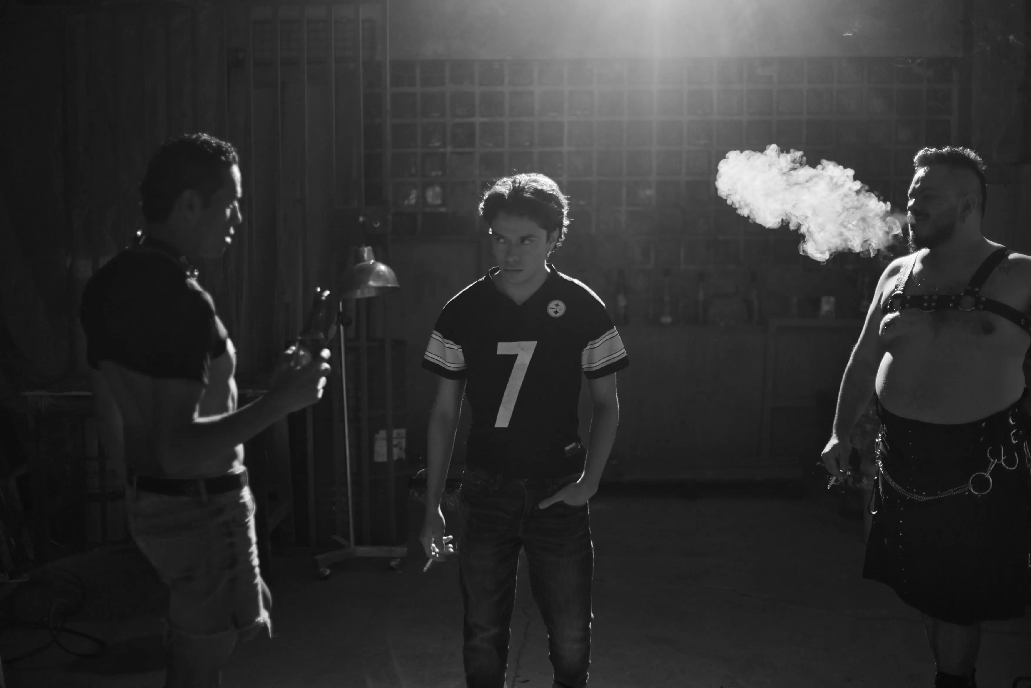 a man holding a cocktail