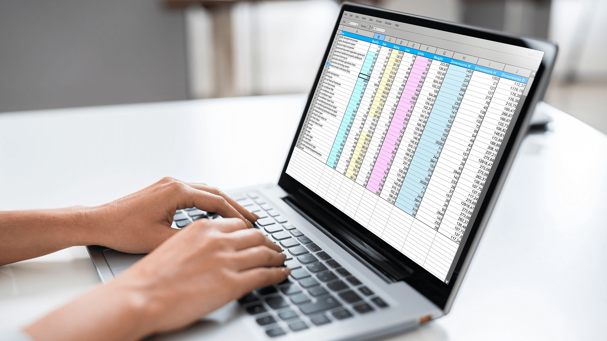 Person using a laptop for spreadsheets - How to Do Conditional Formatting in Google Sheets