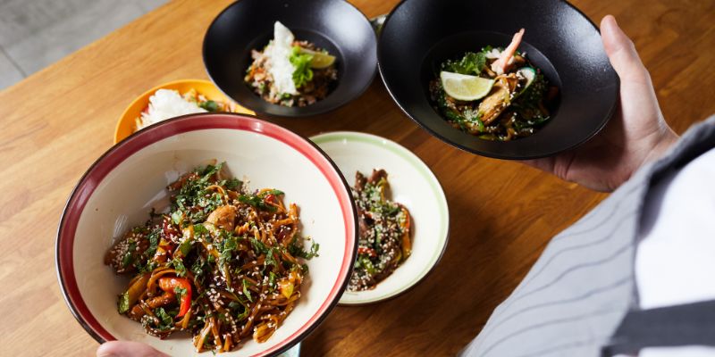 A F&B staff serving food