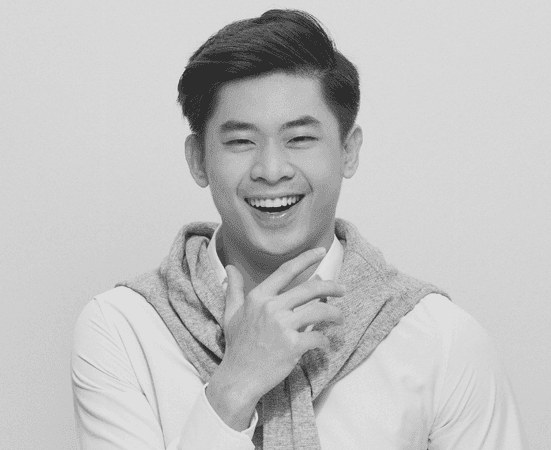 a close up of a red and yellow object on a black background